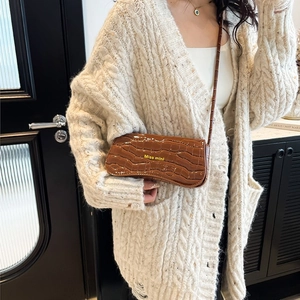 Brown crocodile pattern faux leather shoulder bag with Miss Mini logo and flap design