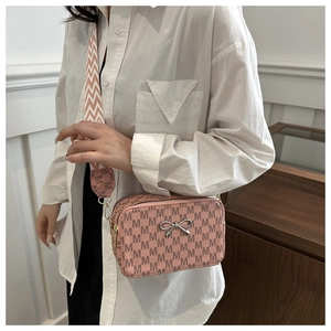 Pink rectangular square crossbody bag with letter print and decorative silver metal bow