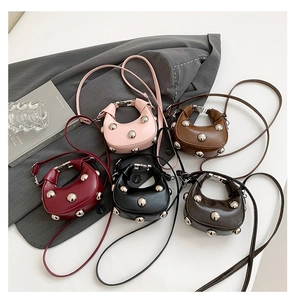 Detailed collection of crescent moon bags with metal rivets and top handles in five colors