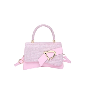 Pink patchwork crossbody bag with sequin fabric, round handle and gold D-ring hardware