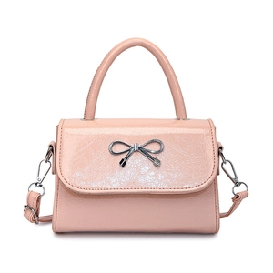 Pink glossy square handbag with silver bow detail and detachable strap for women
