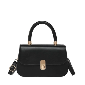 Minimalist black leather square handbag with golden metal lock and circular top handle