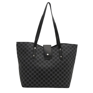Classic large capacity black tote bag with gray monogram print and leather handles