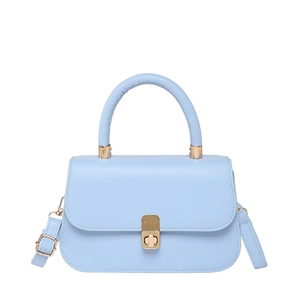 Minimalist light blue leather underarm bag with gold metal clasp and top handle