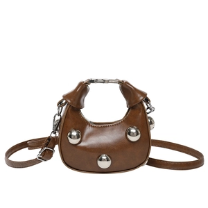 Chic brown hobo shoulder bag with decorative silver studs and knotted handle detail