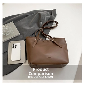 Top view of a dark brown PU leather tote bag with long straps and metal buckle details