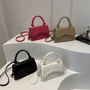 Minimalist square flap handbags with knotted handles in fuchsia, khaki, black, and white