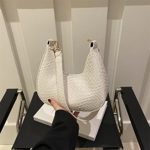 White woven textured crescent shoulder bag with gold buckles and wide strap for women