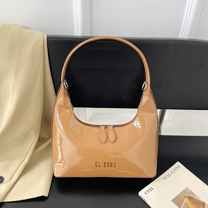 Glossy khaki patent leather baguette handbag with metallic zipper and gold letter logo