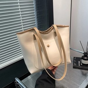 Minimalist large-capacity tote bag in cream and khaki patchwork leather with outer pocket