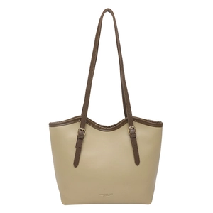 Minimalist beige tote bag with brown leather straps and gold buckle for women