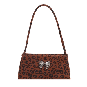Chic leopard print underarm bag with silver butterfly accent and slim shoulder strap