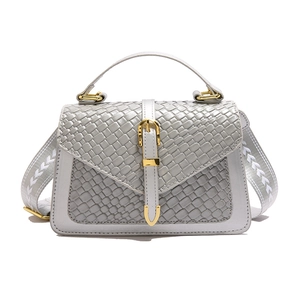 Light gray crocodile texture crossbody bag with gold buckle and woven details