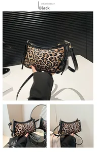 Detailansicht der Boston-Tasche mit Leopardenmuster, Lacklederbesatz und Schleifendetail