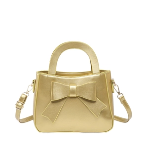 Elegante goldene Damen-Handtasche mit Schleife, Perlglanz-Finish und Metallgriffen