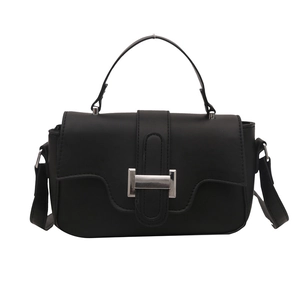 Classic black crossbody square bag with silver metal lock and top handle in matte finish