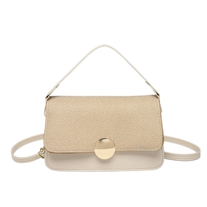 Two-tone woven flap shoulder bag with white faux leather and gold buckle in a minimalist style