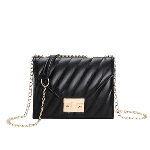 Classic black quilted crossbody bag with gold chain strap and stylish twist lock buckle
