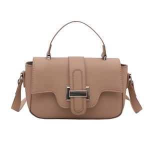 Minimalist beige matte crossbody handbag with silver buckle and top handle for women