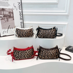 Chic leopard print shoulder bags with glossy trim and bow details in four stylish colors