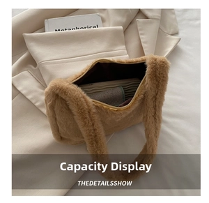 Detailed interior of camel plush tote showing spacious storage capacity and soft texture