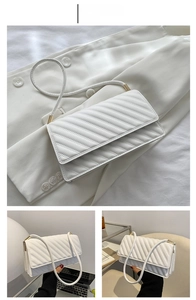 Détails du sac à rabat blanc matelassé avec broderie élégante et ferrures dorées chic