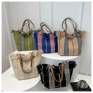 Bohemian canvas tote bags with stripe patterns and fringe tassels in various colors