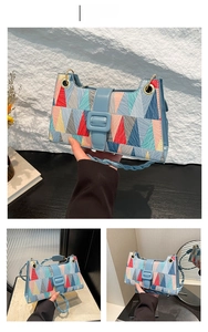 Detail view of geometric patchwork shoulder bag featuring colorful triangle patterns