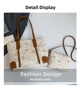 Detail view of canvas tote and matching small crossbody bag set with brown leather trim