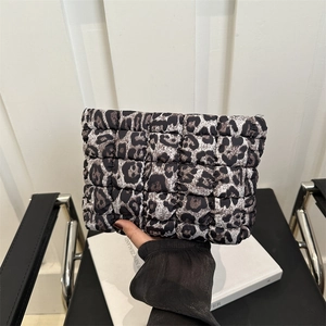 Stylish leopard print quilted clutch bag for women with a puffy texture and zipper