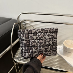 Quilted leopard print clutch bag for women with minimalist envelope style and gray pattern