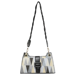 Geometric pattern shoulder bag with a black leather flap and woven handle in trapezoid shape