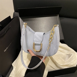 Light blue marble texture hobo shoulder bag with gold chain and D-buckle detail