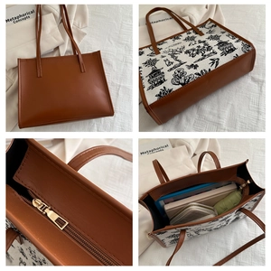 Detail view of landscape print tote bag showing stitching and metal zipper quality