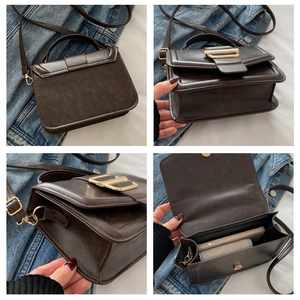 Detail view of brown leather crossbody bag showing back, side, bottom and interior capacity