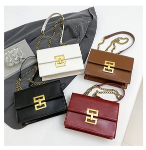 Detail view of retro flap square chain bags in white, dark coffee, black, and wine red