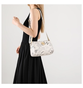 Detail of off-white crossbody bag featuring black letter print and wide shoulder strap