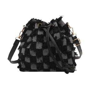 Fashionable checkered tweed bucket bag with fringed texture and leather drawstring strap