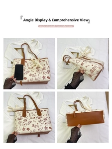 Close-up of cute cartoon graffiti print and plush bunny charm on a PU tote bag