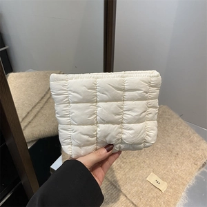 Fashionable pleated quilted makeup bag in creamy white with puffer design for women