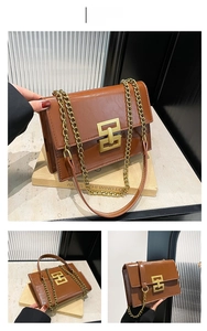 Detail of brown vintage flap bag showing glossy pleated texture and square metal lock