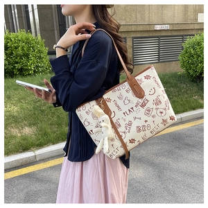 Cute cartoon graffiti tote bag in creamy white PU leather with plush bunny pendant