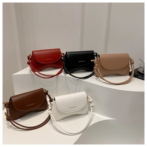 Minimalist crossbody bags displayed in five colors with unique rope knot shoulder straps