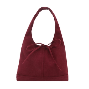 Minimalist burgundy suede shoulder bag featuring a stylish bow tie design and clean lines