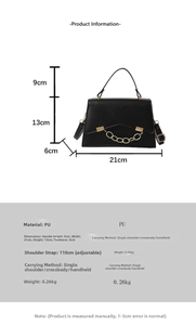 Detail view of small black PU crossbody bag with golden chain and size dimensions