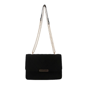 Chic black velvet chain bag with V-quilted stitching and golden metal hardware