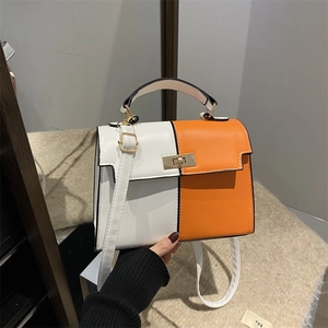 Sac à main bicolore blanc et orange style Kelly avec boucle dorée et bandoulière