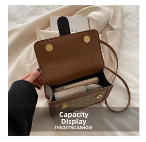 Interior view of the vintage brown crossbody bag showing spacious storage for essentials