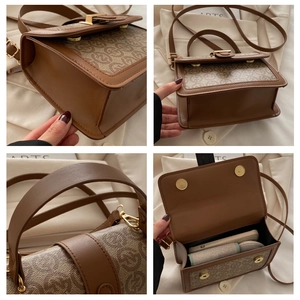 Detail view of vintage monogram crossbody bag showing gold hardware and daily essentials