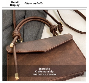 Detail shot of brown vintage bag featuring decorative handle knots and drawstring finish